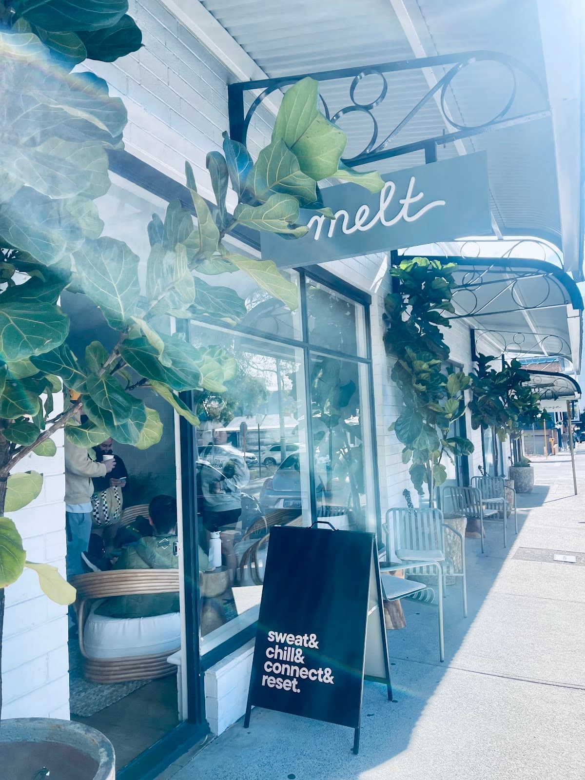 Melt Wellness Studios logo