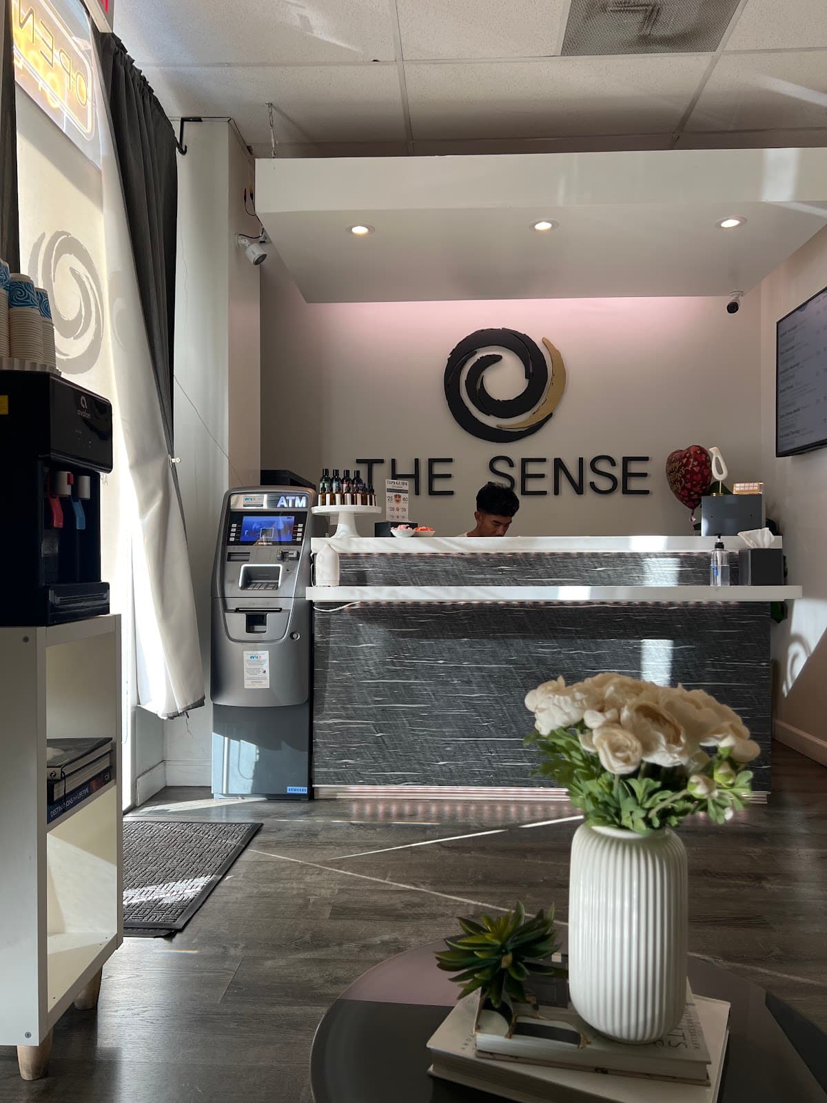The Sense Massage & Wellness Center logo